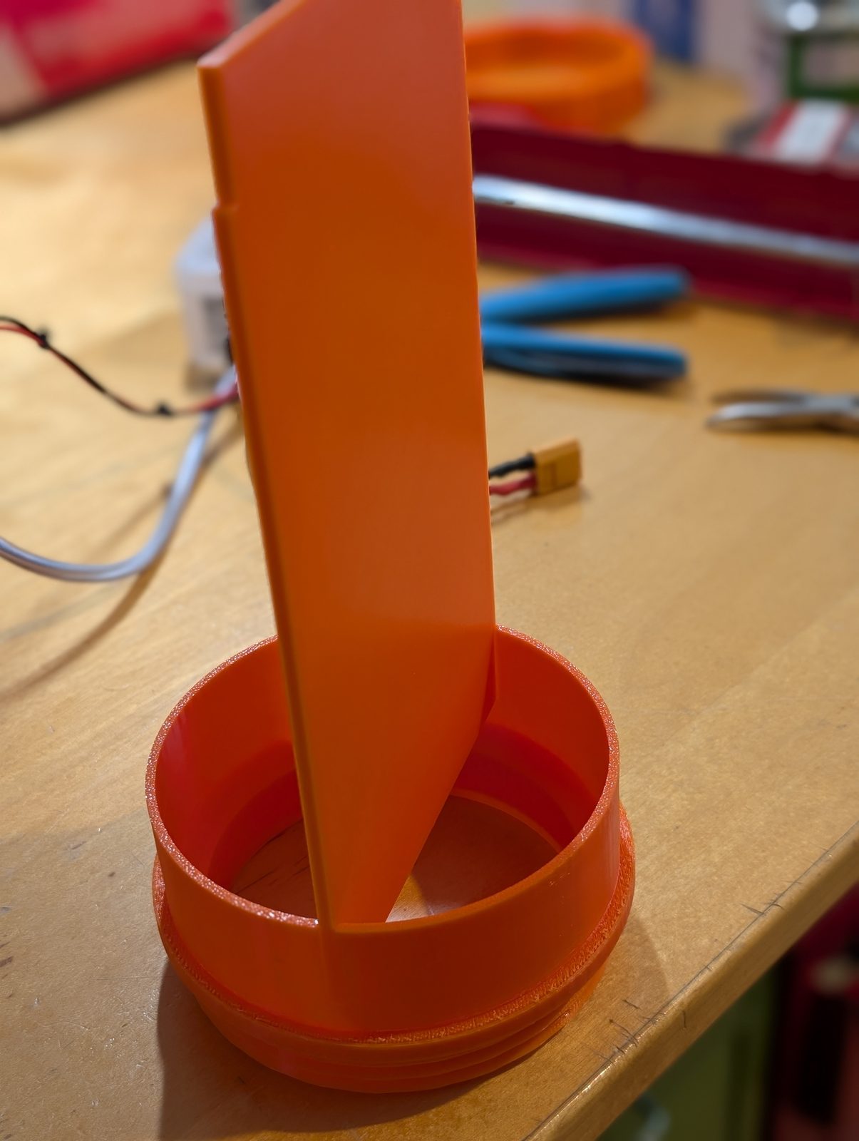 The printed divider dropped into the insert, showing the small float chamber