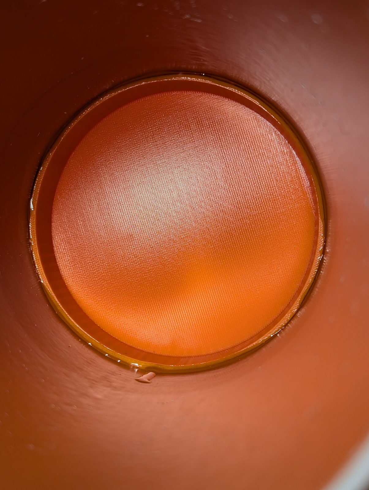 Looking down the pipe at the printed floor, glued in and sealed